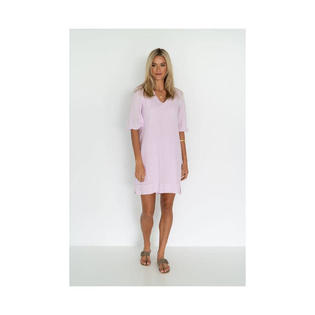 A pink Promise dress, worn by a lady, front view